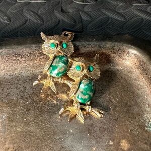 Gold Owls pendant with green stones